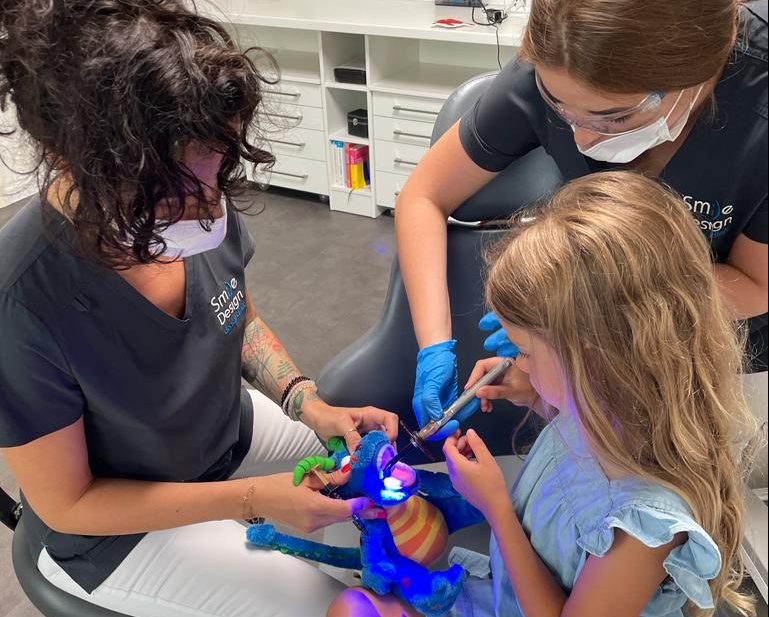 a child demonstrating dental examination