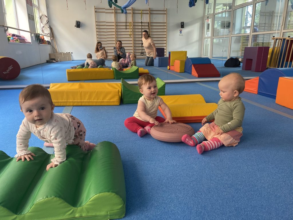 babies playing at a playground