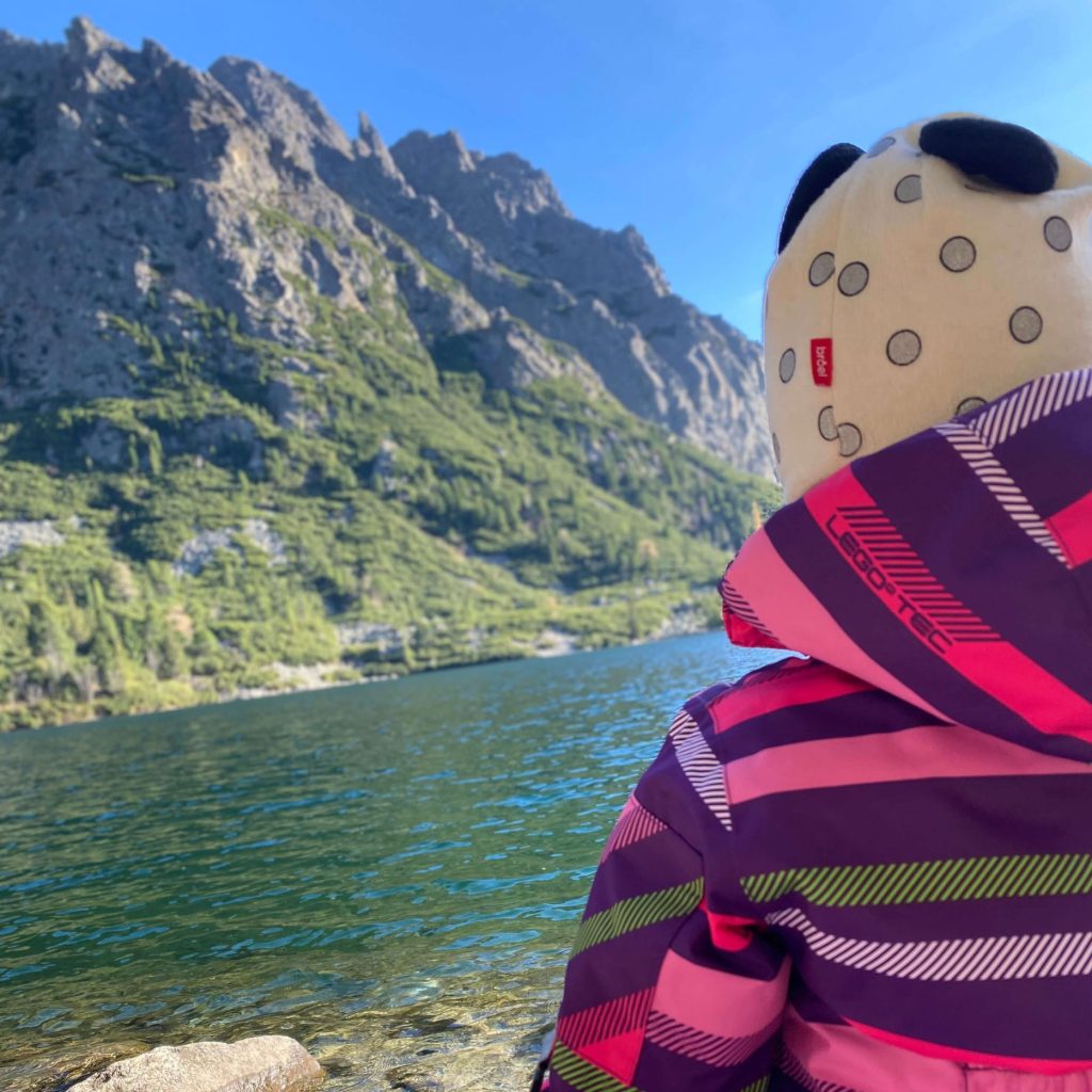 baby near a lake